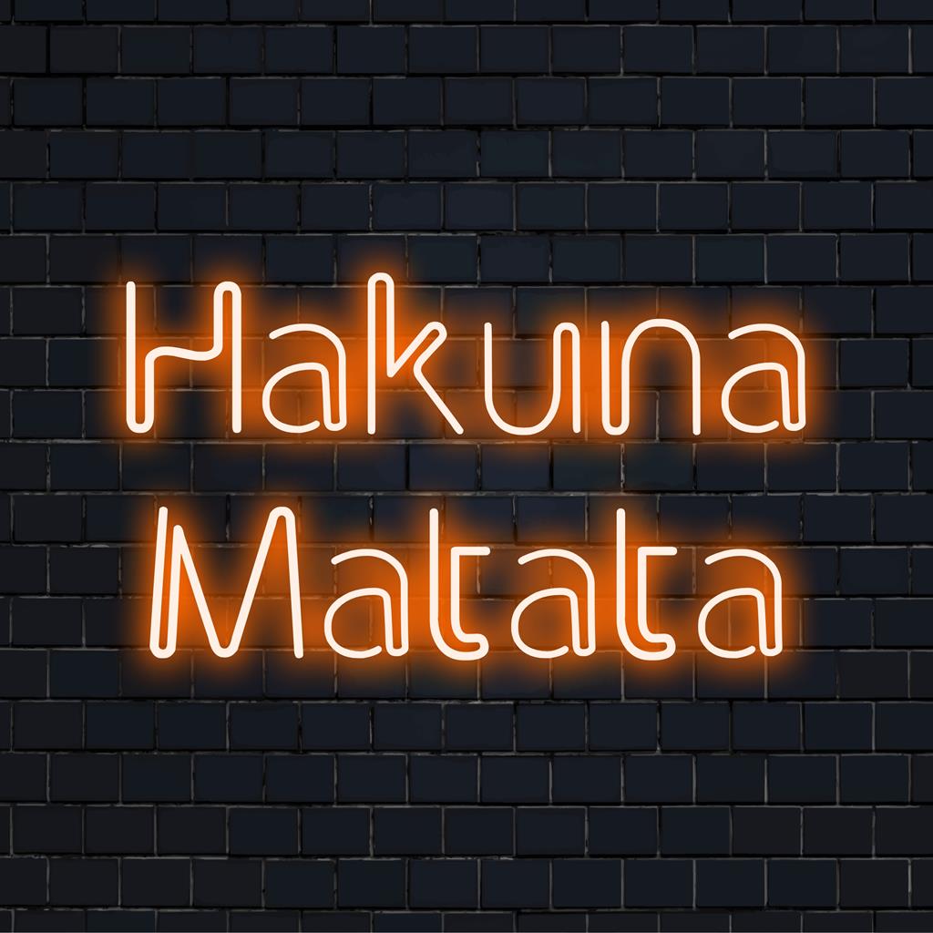 Custom LED neon sign displaying Hakuna Matata in vibrant colors, ideal neon decor for joyful living spaces.