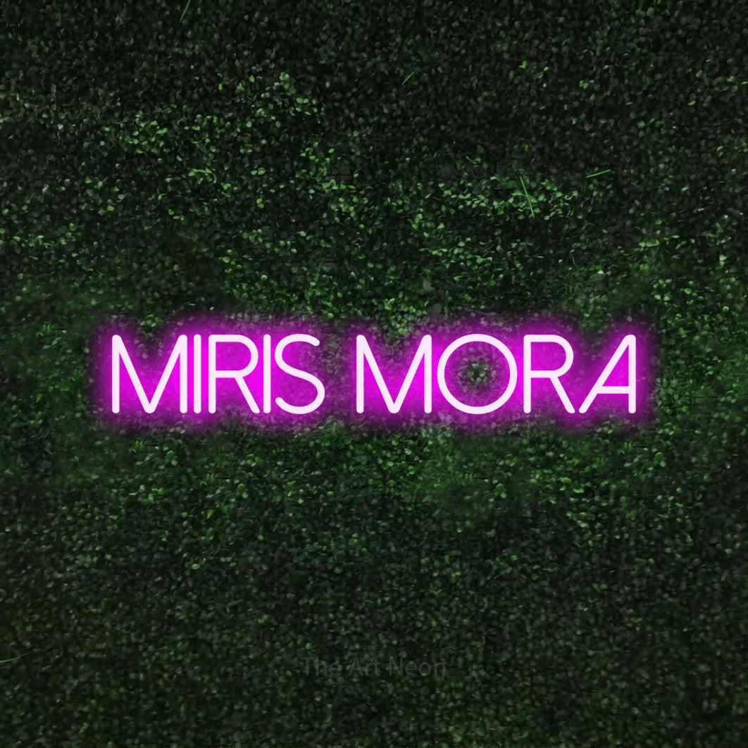 LED neon sign reading “miris mora”, arranged in a single line.