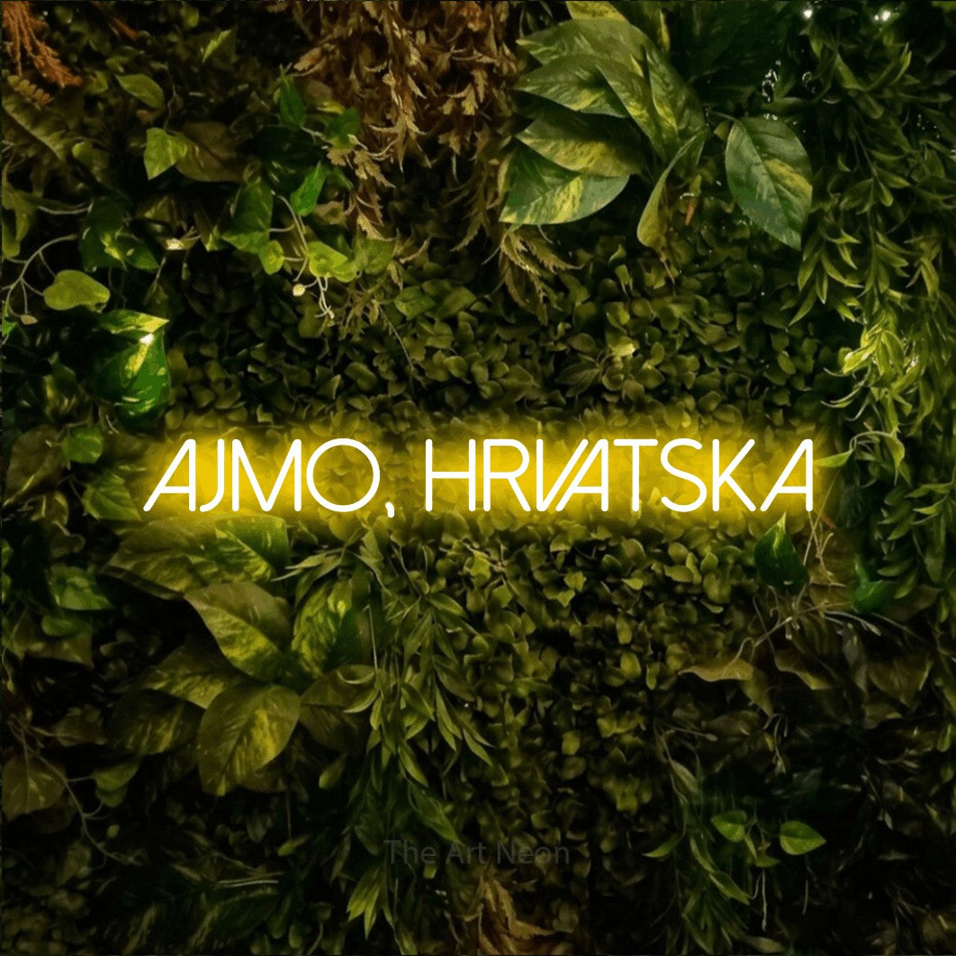 LED neon sign reading “AJMO, HRVATSKA”, arranged in a single line.