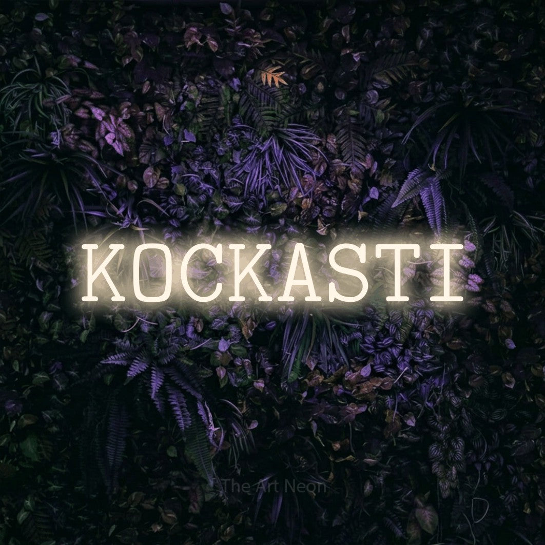 LED neon sign reading “KOCKASTI”, arranged in a single line.
