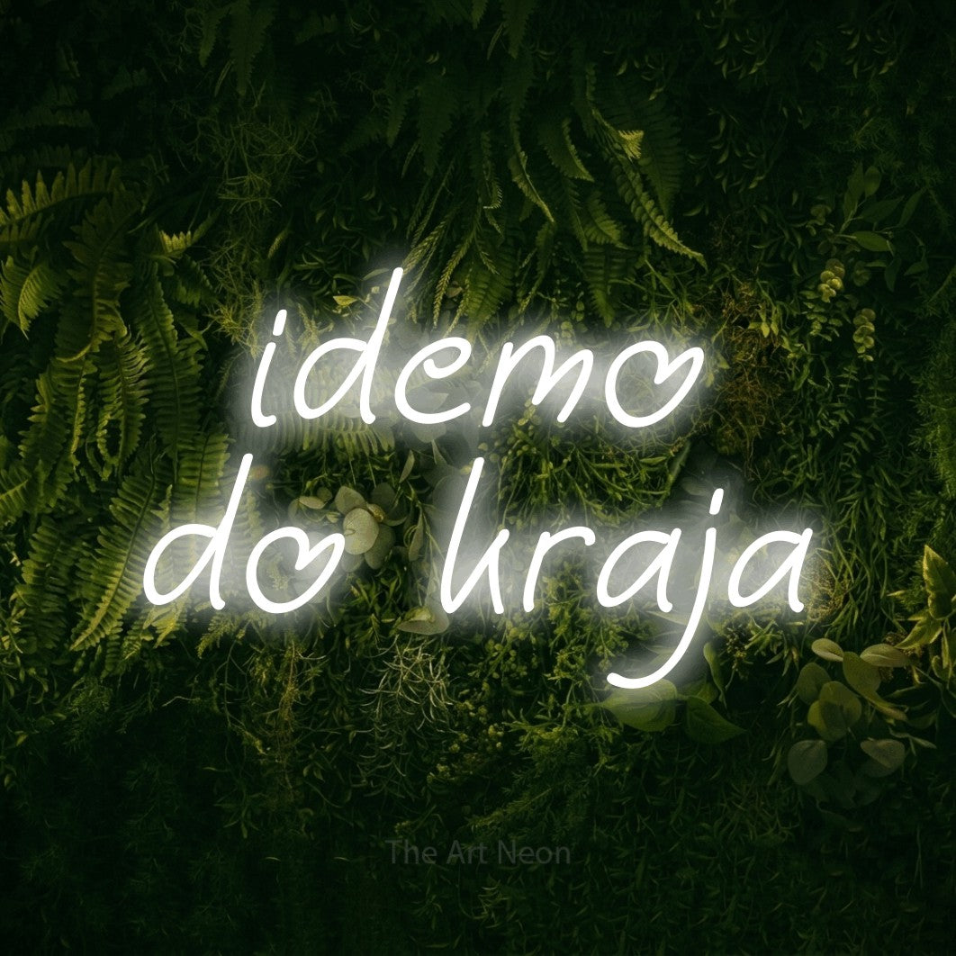 LED neon sign reading “idemo do kraja”, arranged in two lines.