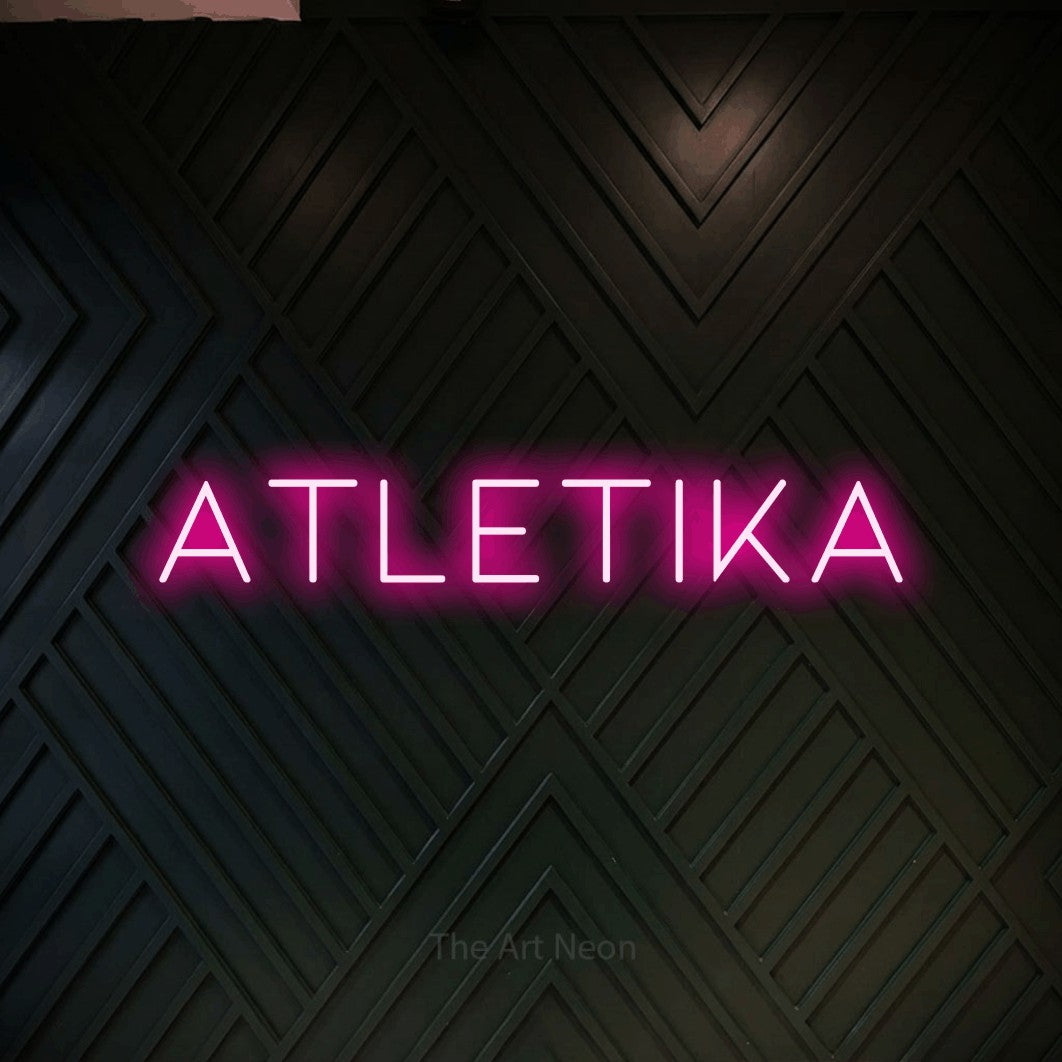 LED neon sign reading “atletika”, arranged in a single line.