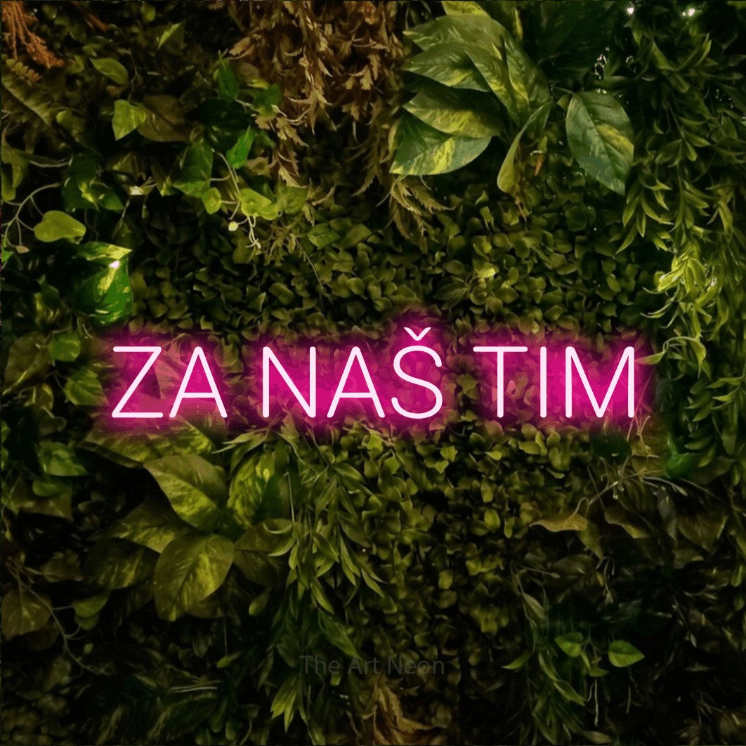 LED neon sign reading “ZA NAŠ TIM”, arranged in a single line.