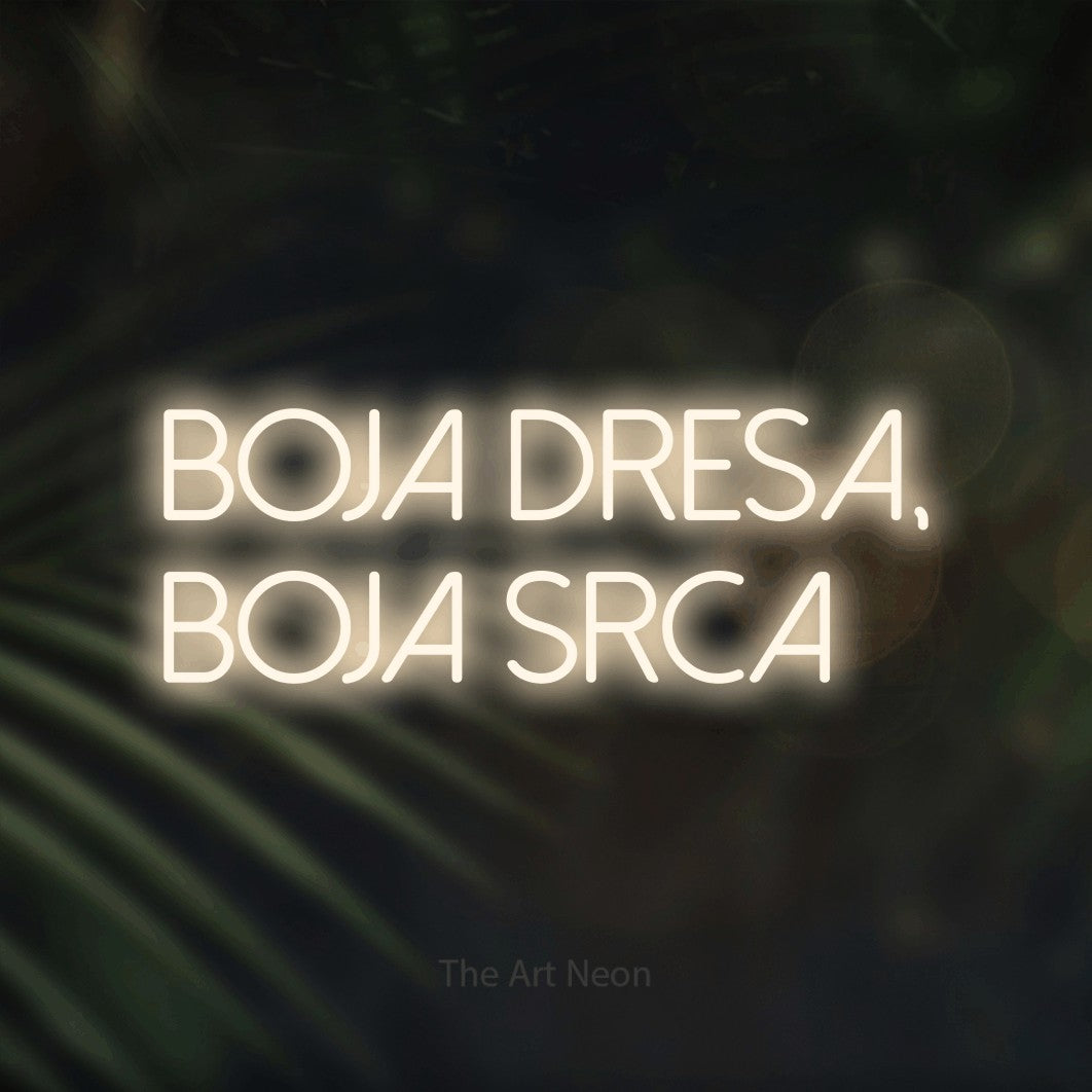 LED neon sign reading “BOJA DRESA, BOJA SRCA”, arranged in two lines.