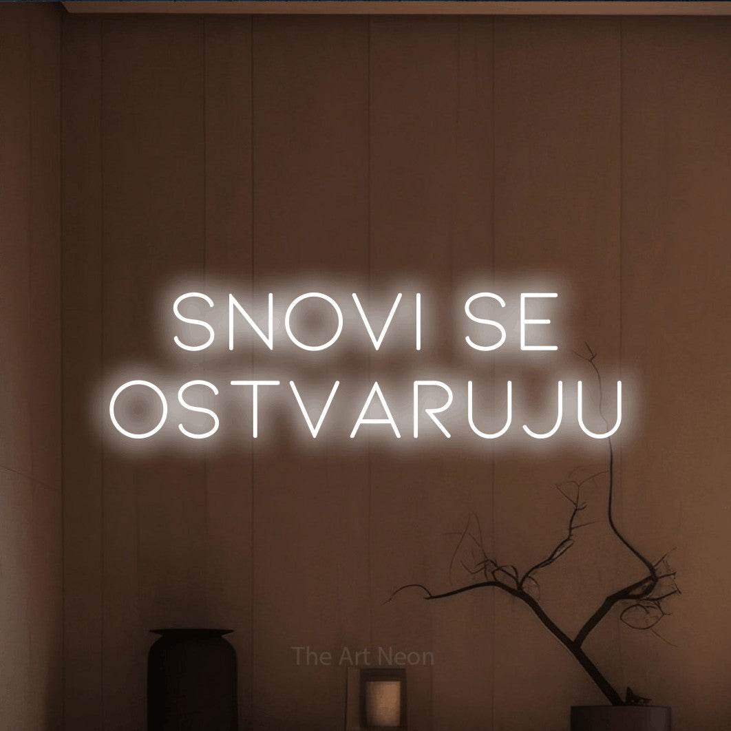 LED neon sign reading “Snovi se Ostvaruju”, arranged in two lines.
