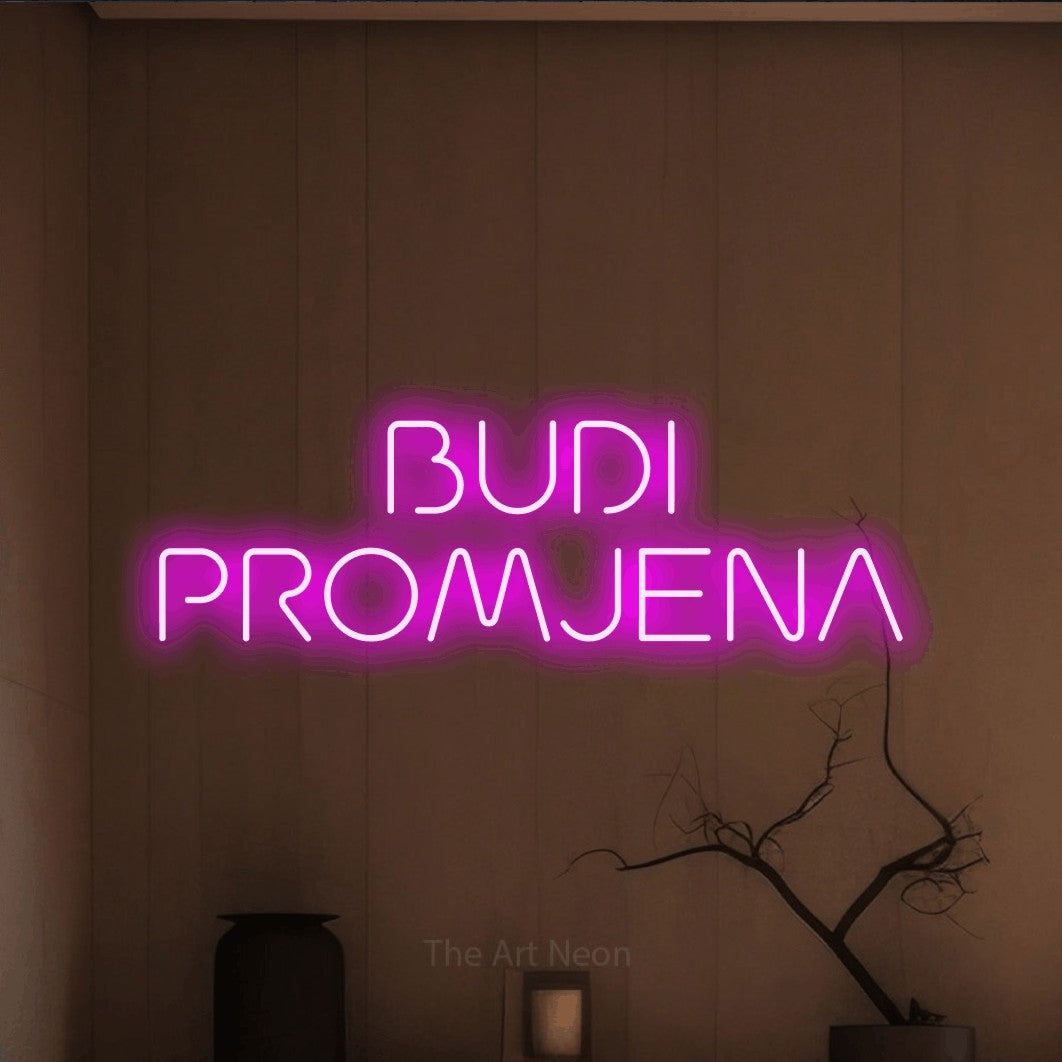 LED neon sign reading “BUDI PROMJENA”, arranged in two lines.
