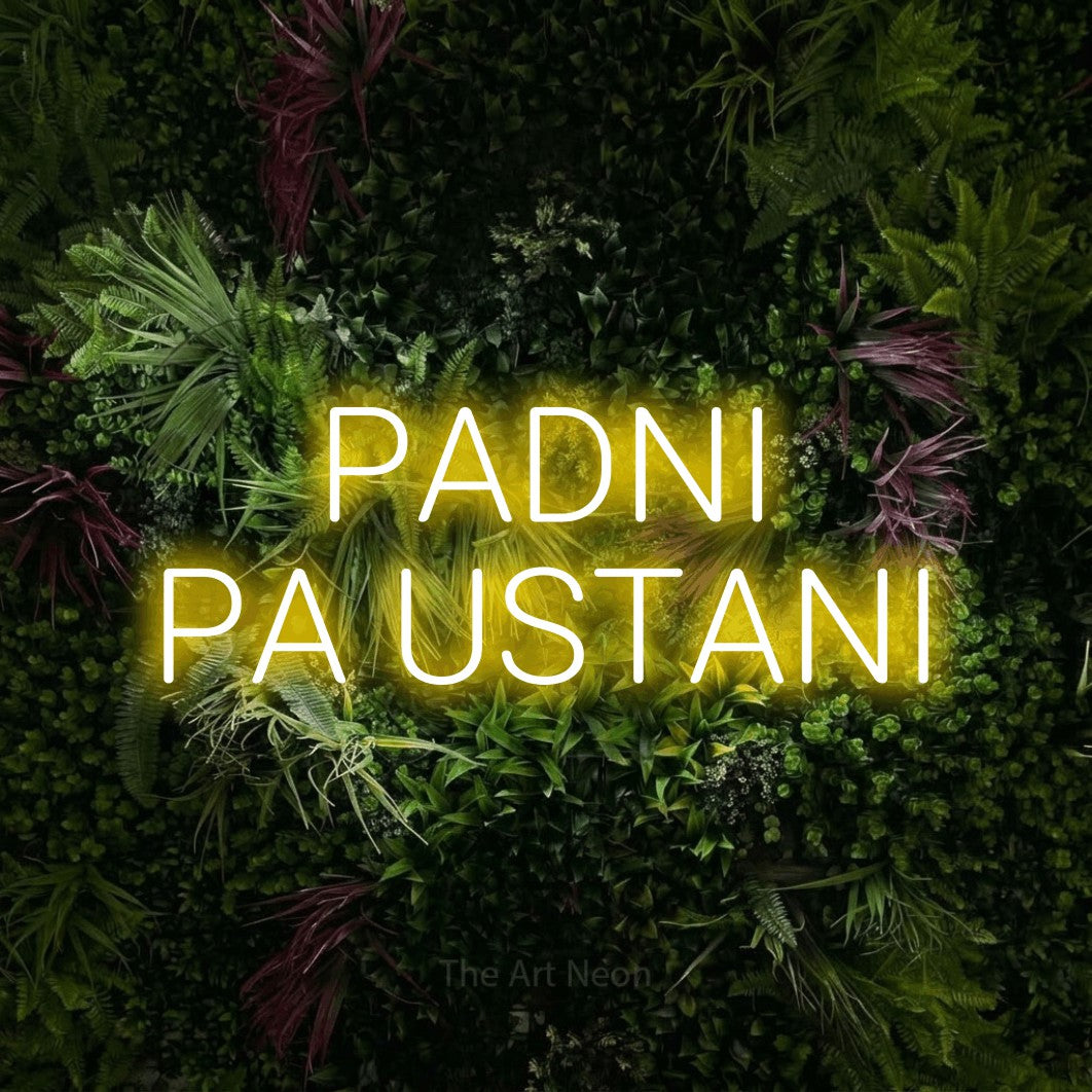 LED neon sign reading “PADNI PA USTANI”, arranged in two lines.