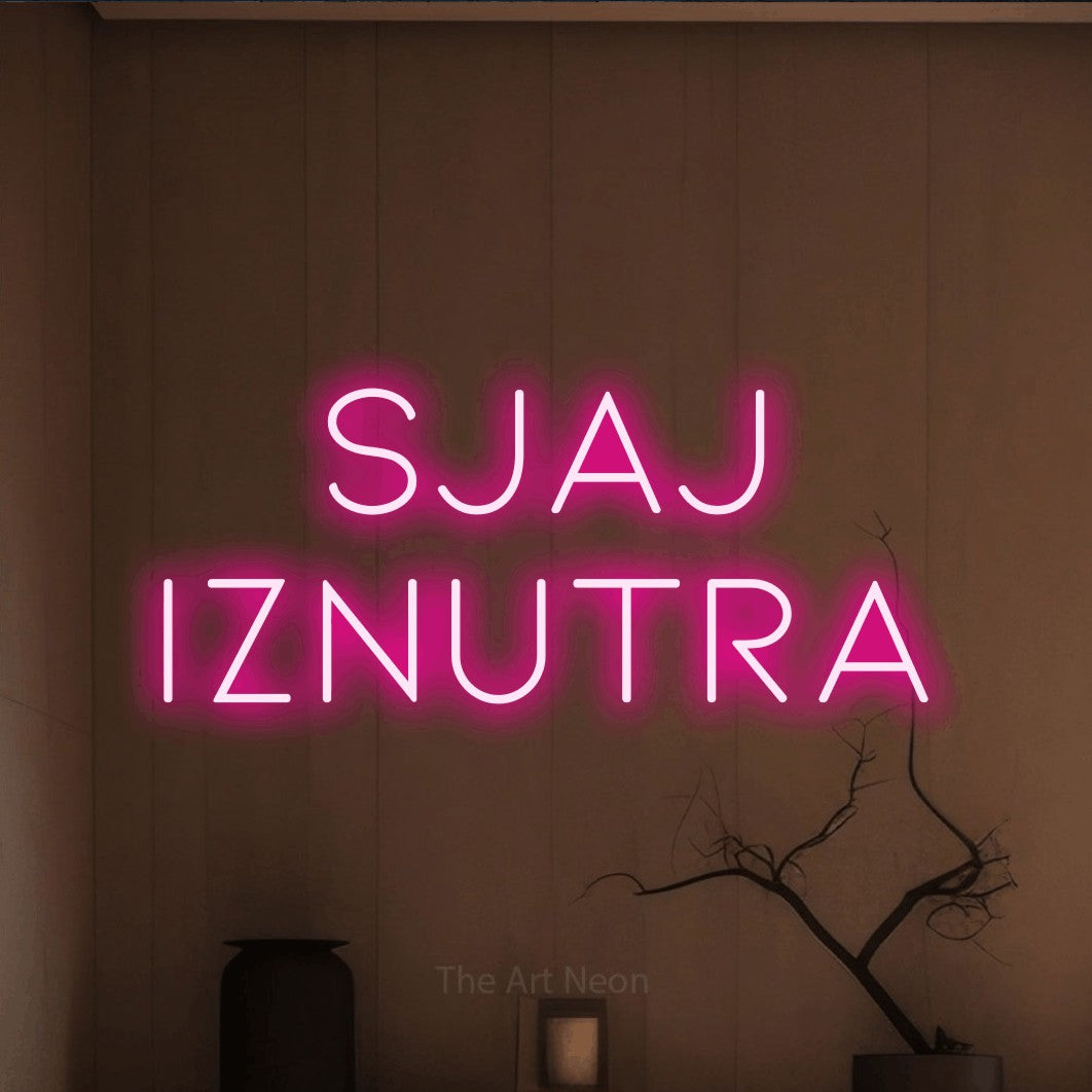 LED neon sign reading “SJAJ IZNUTRA”, arranged in two lines.