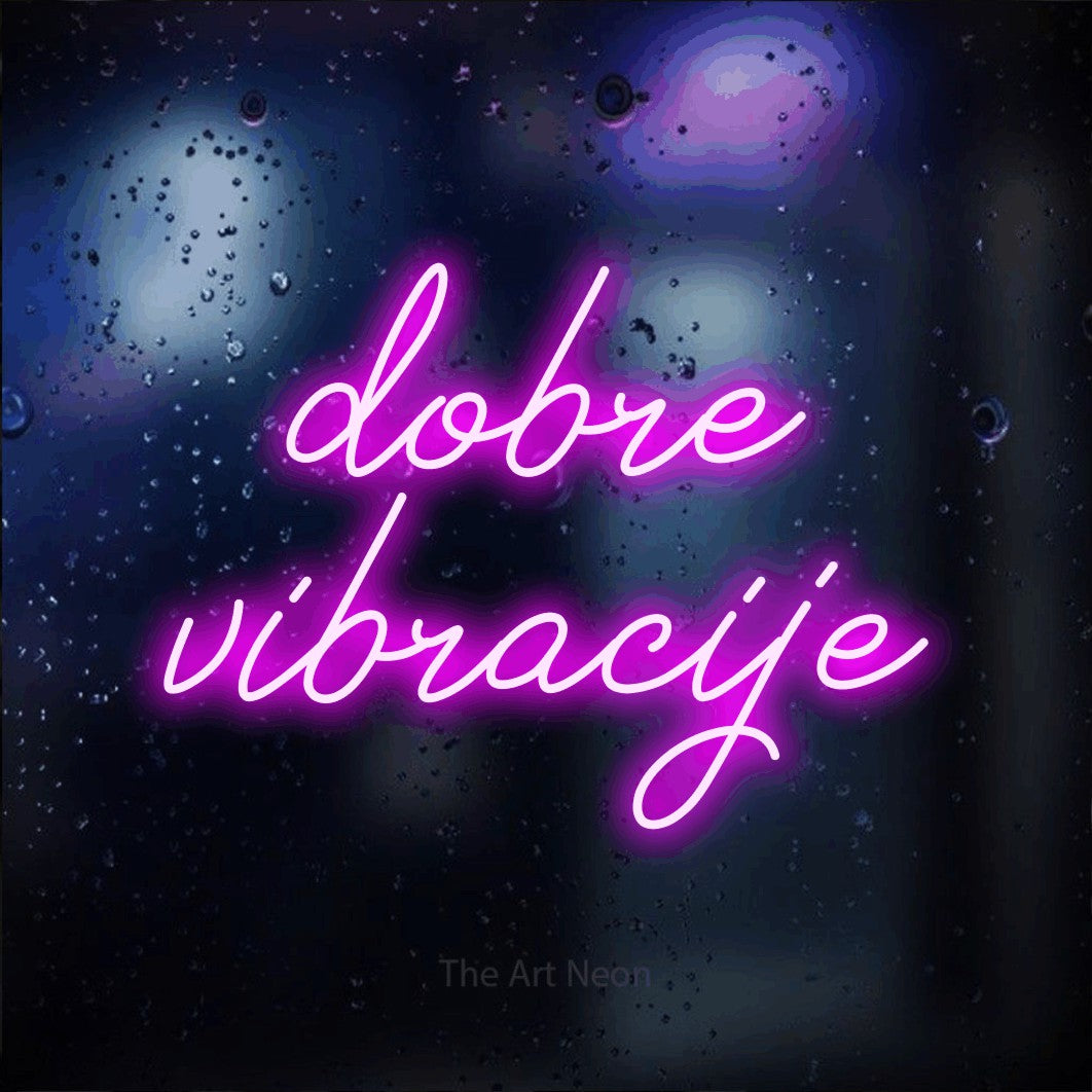 LED neon sign reading “dobre vibracije”, arranged in two lines.