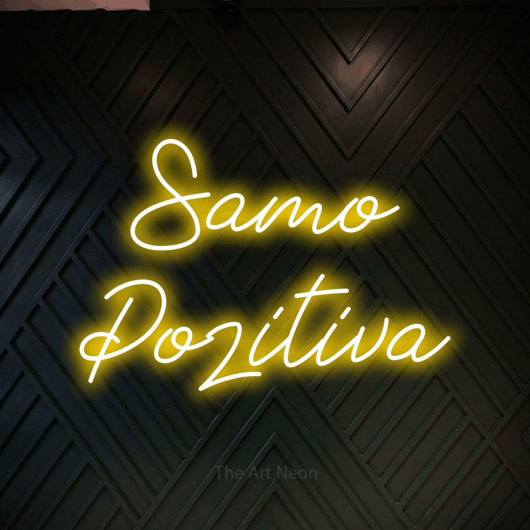 LED neon sign reading “Samo Pozitiva”, arranged in two lines.