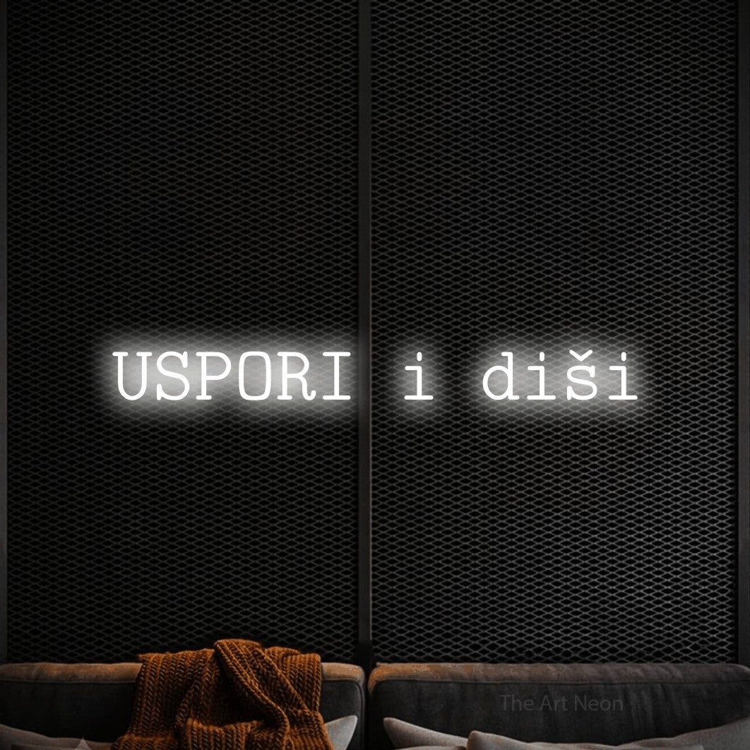 LED neon sign reading “USPORI i diši”, arranged in a single line.