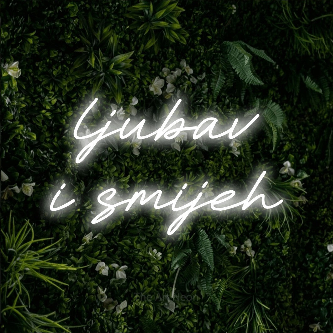 LED neon sign reading “ljubav i smijeh”, arranged in two lines.