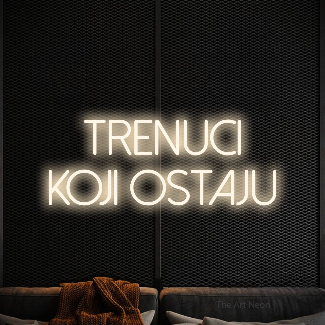 LED neon sign reading “TRENUCI KOJI OSTAJU”, arranged in two lines.