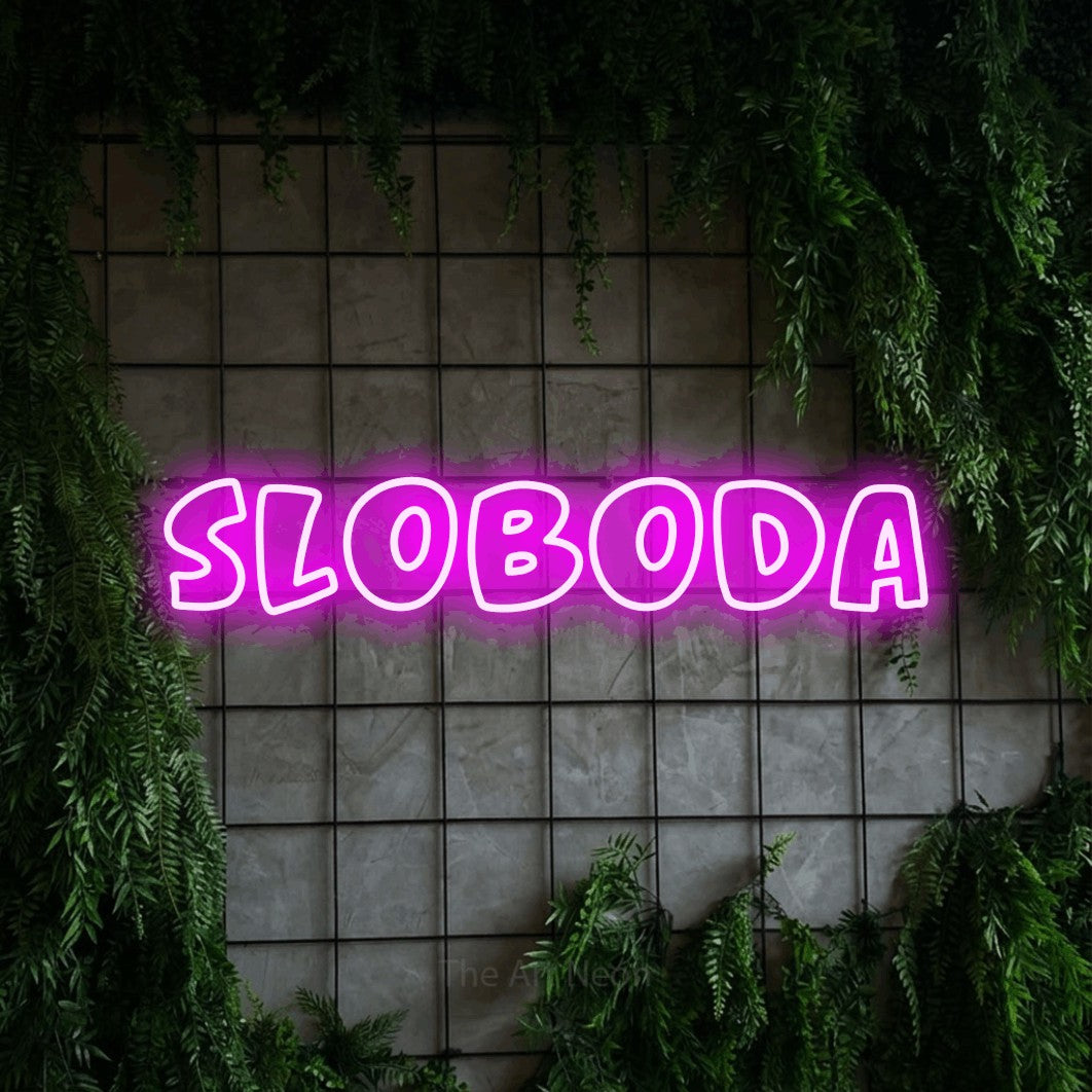 LED neon sign reading “sloboda”, arranged in a single line.