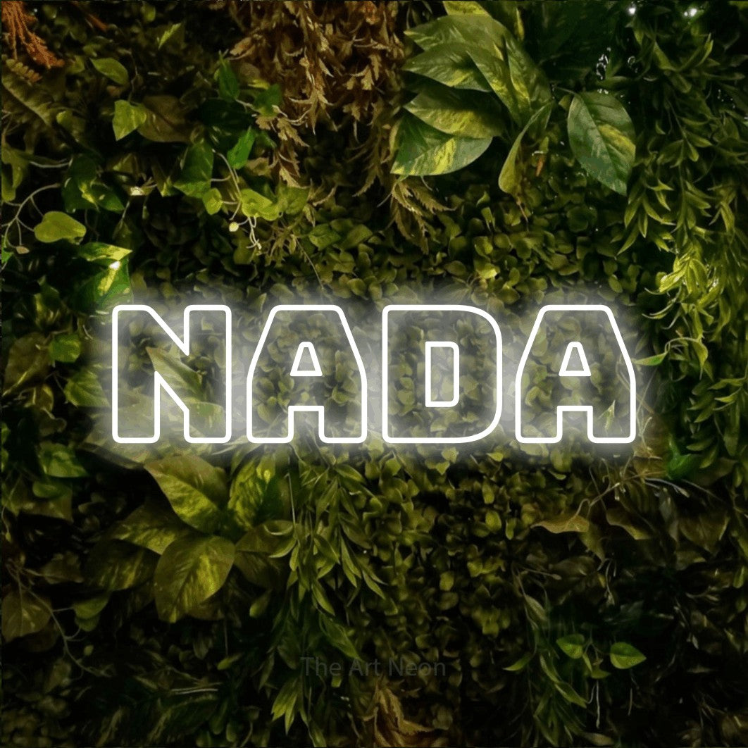 LED neon sign reading “Nada”, arranged in a single line.