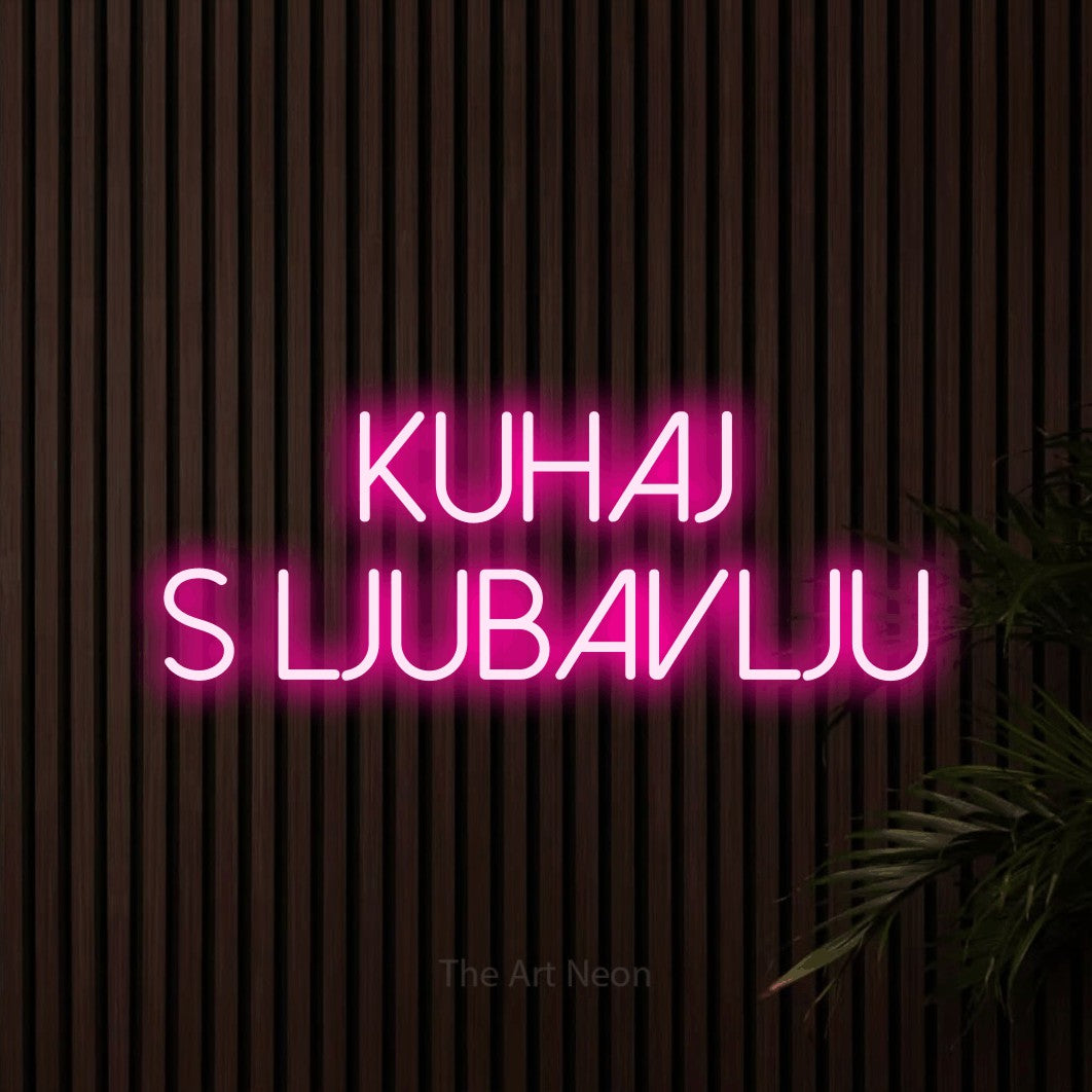 LED neon sign reading “KUHAJ S LJUBAVLJU”, arranged in two lines.