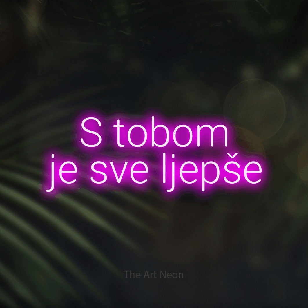 LED neon sign reading “S tobom je sve ljepše”, arranged in two lines.