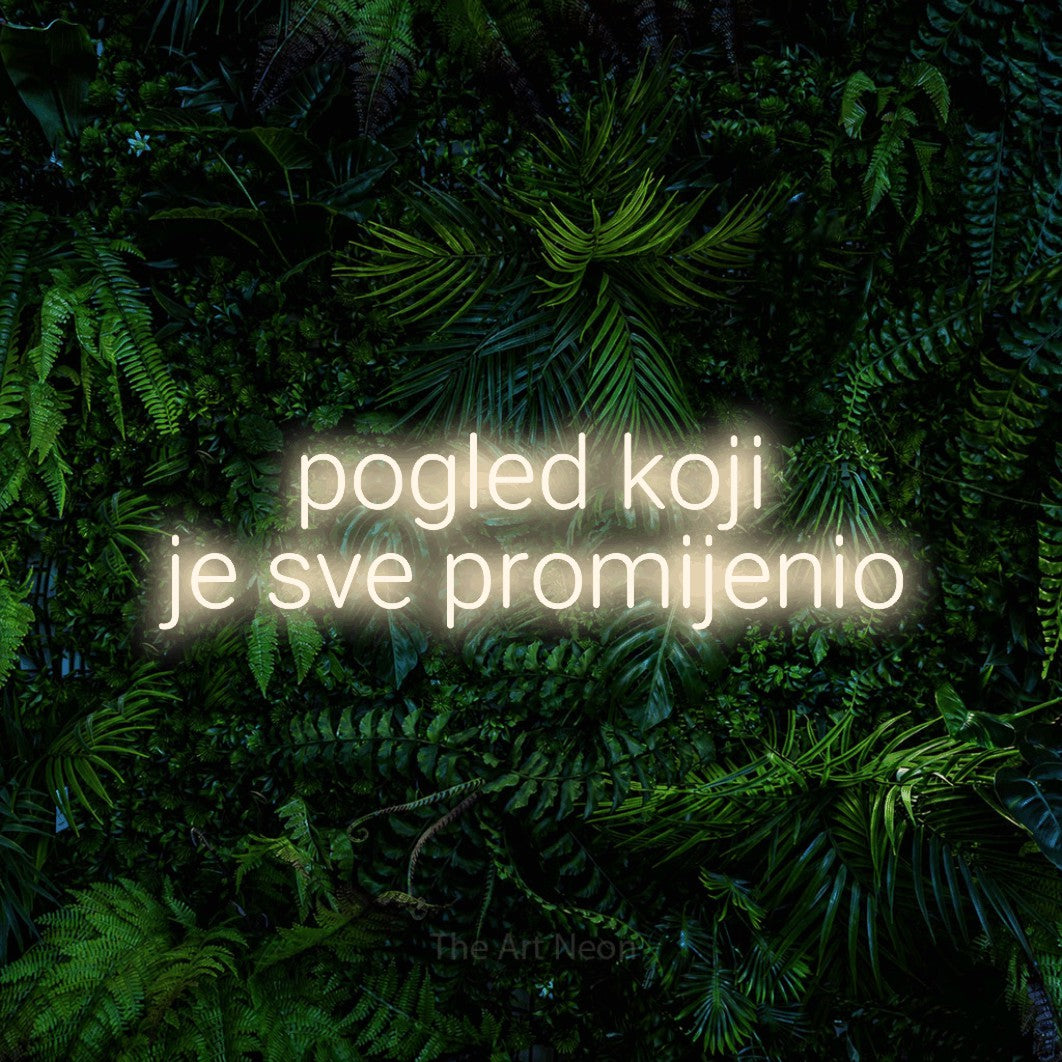 LED neon sign reading “pogled koji je sve promijenio”, arranged in two lines.