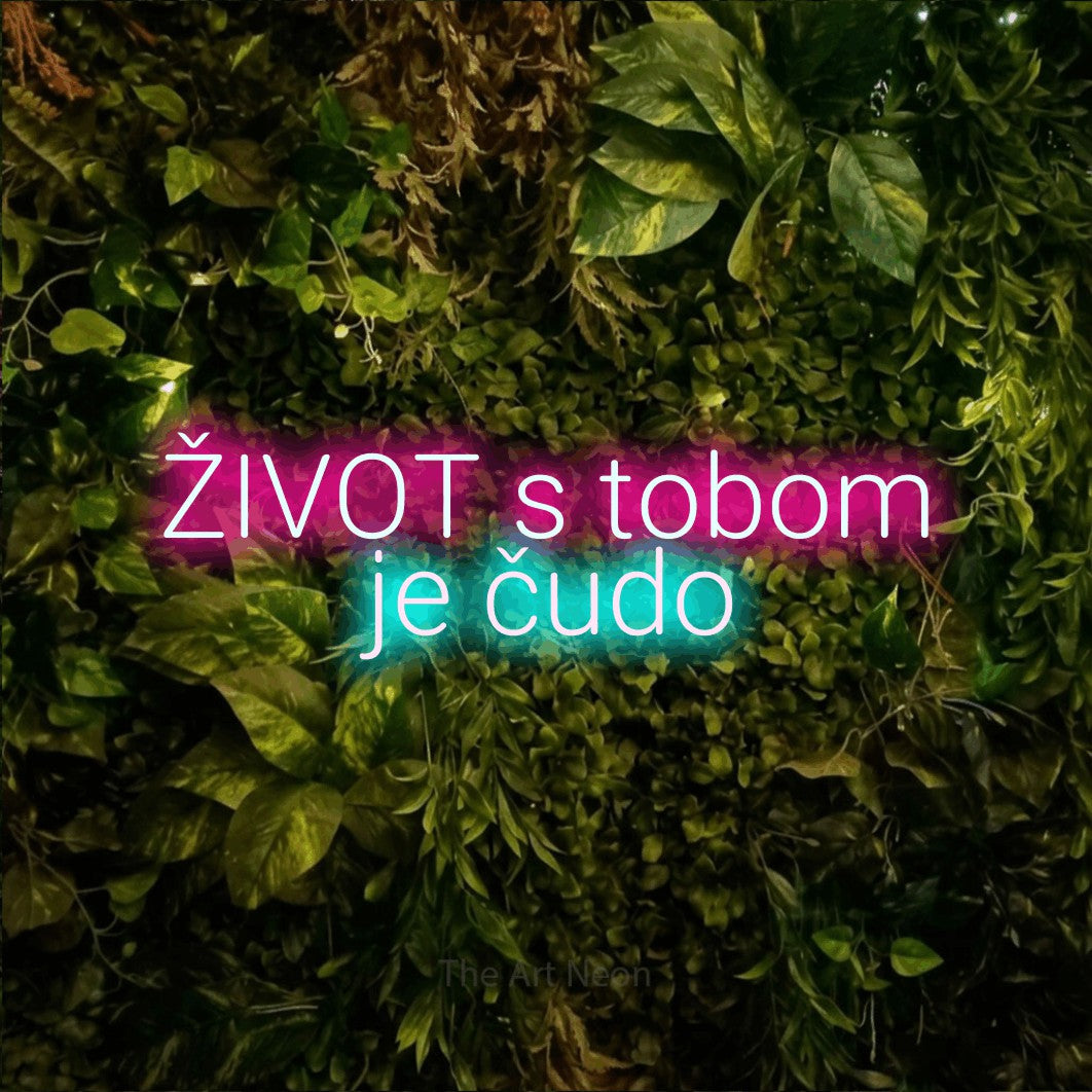 LED neon sign reading “ŽIVOT s tobom je čudo”, arranged in two lines.