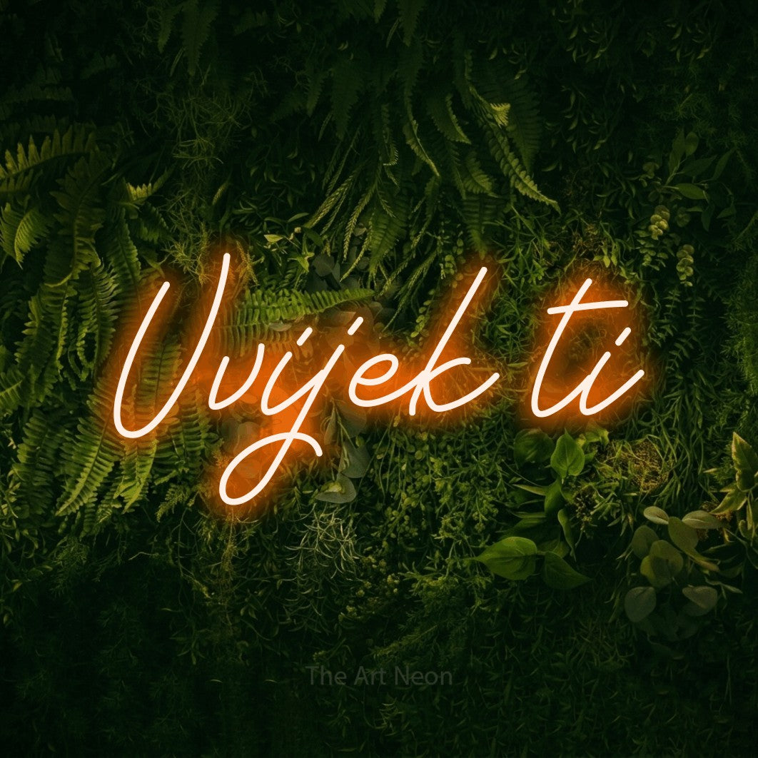 LED neon sign reading “Uvijek ti”, arranged in a single line.