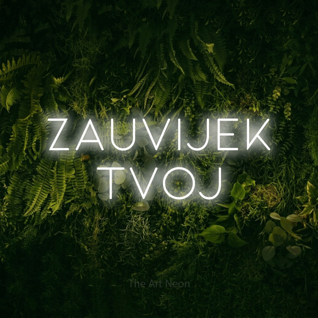 LED neon sign reading “Zauvijek Tvoj”, arranged in two lines.