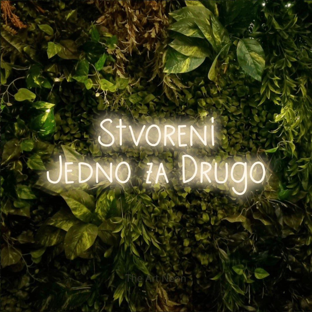 LED neon sign reading “Stvoreni Jedno za Drugo”, arranged in two lines.