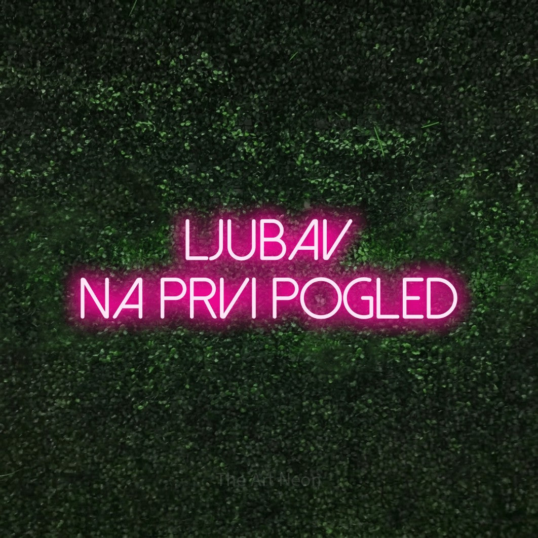 LED neon sign reading “LJUBAV na prvi pogled”, arranged in two lines.