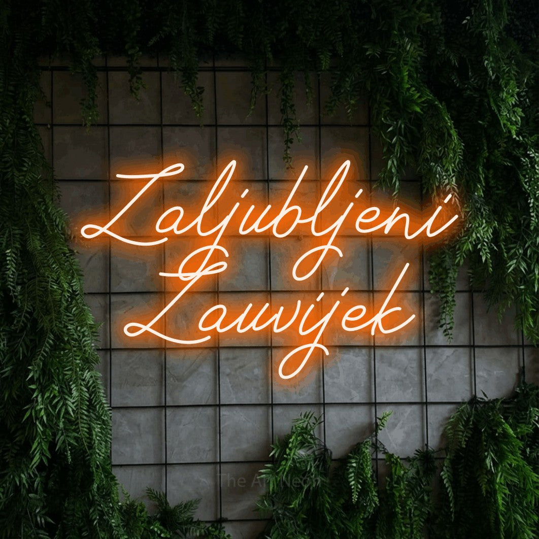 LED neon sign reading “Zaljubljeni Zauvijek”, arranged in two lines.