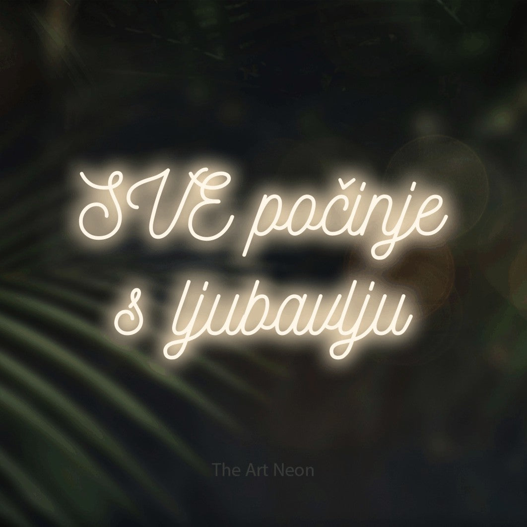 LED neon sign reading “SVE počinje s ljubavlju”, arranged in two lines.