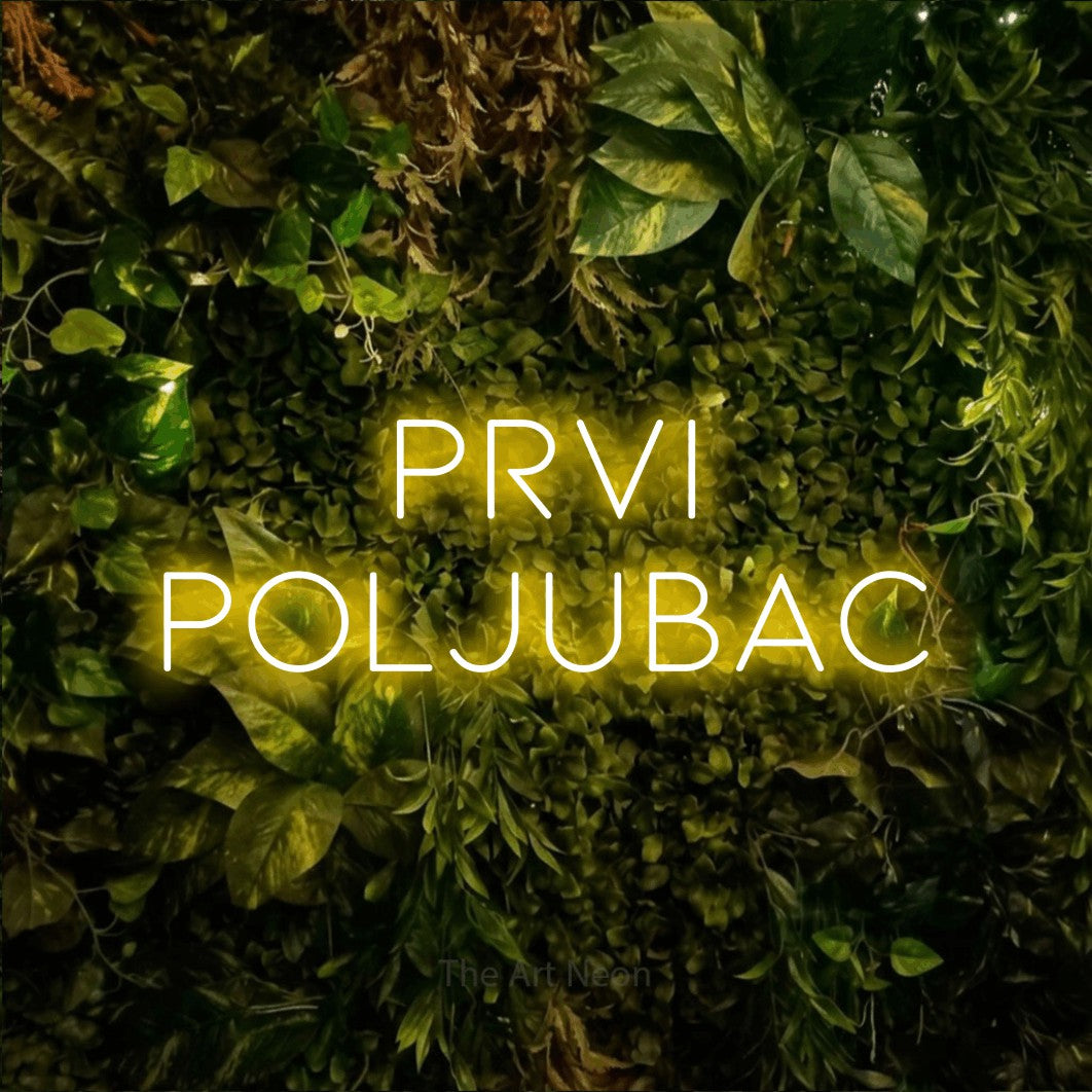 LED neon sign reading “prvi poljubac”, arranged in two lines.