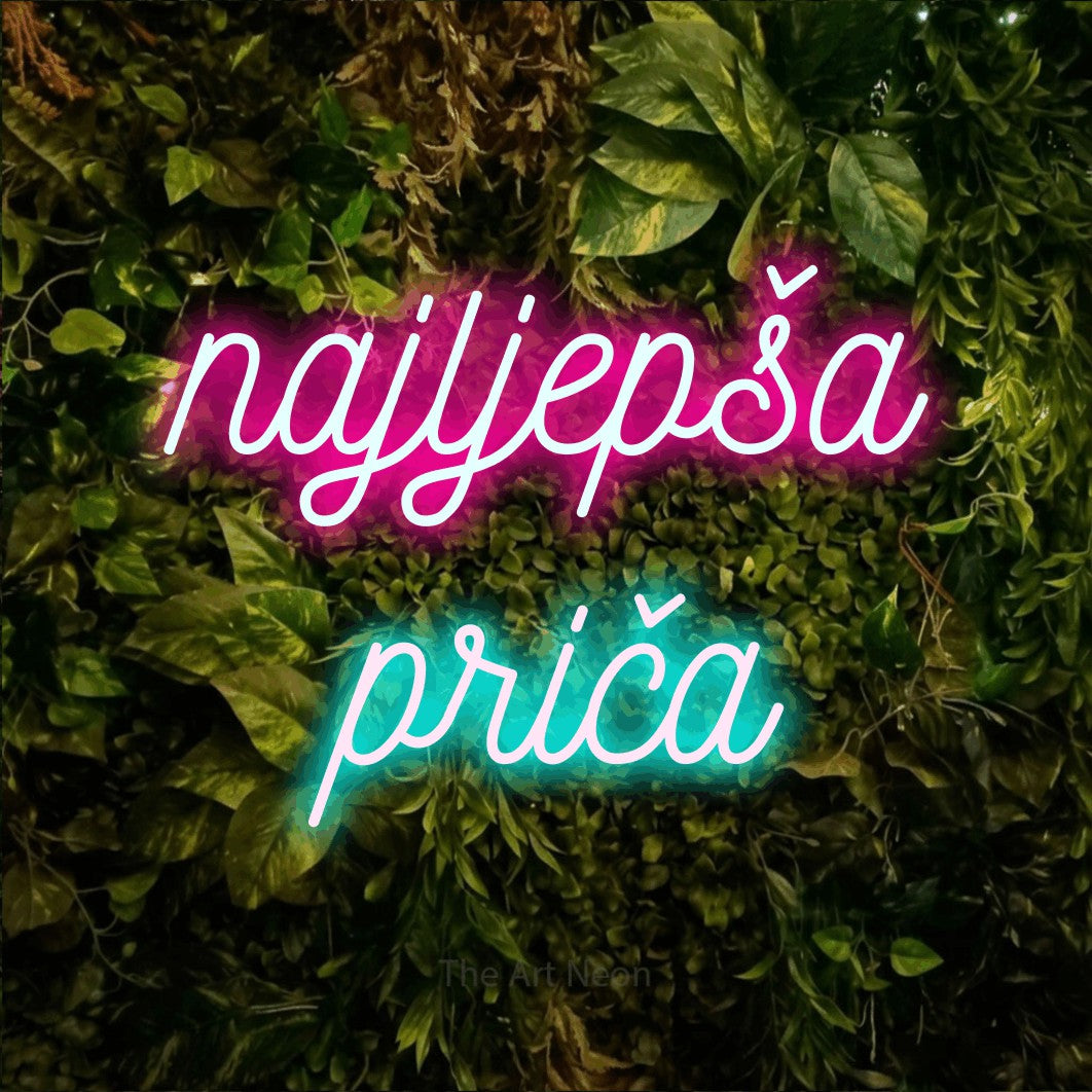 LED neon sign reading “najljepša priča”, arranged in two lines.