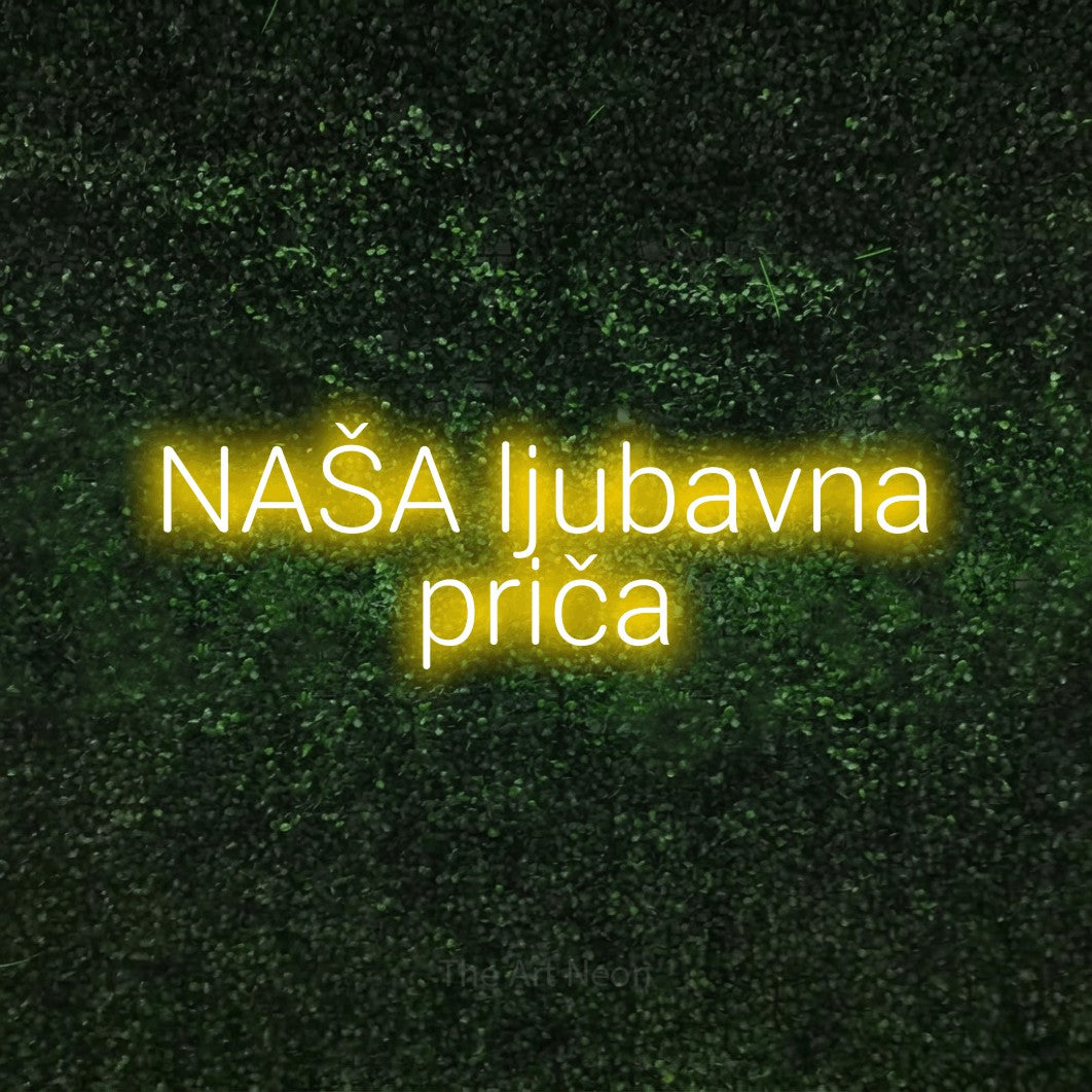 LED neon sign reading “NAŠA ljubavna priča”, arranged in two lines.