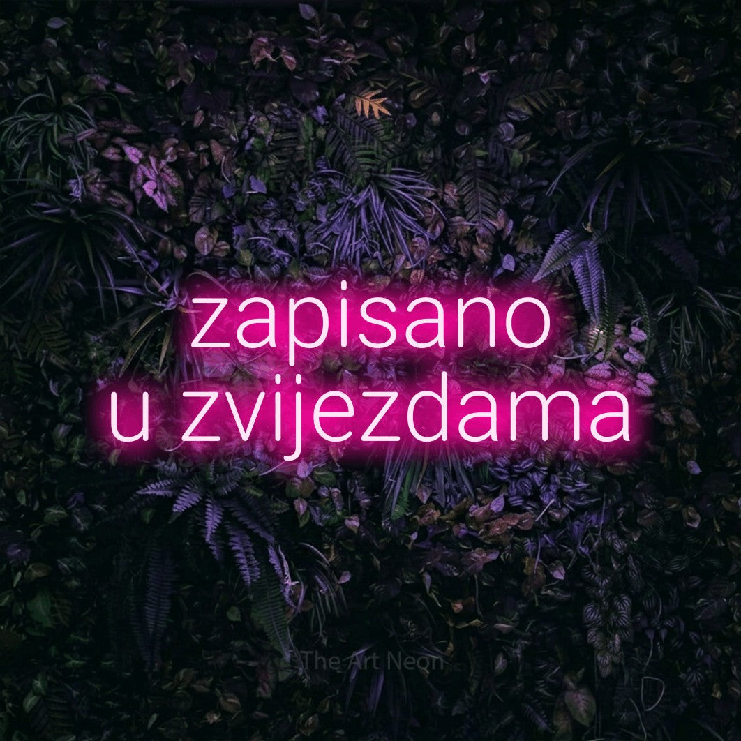 LED neon sign reading “zapisano u zvijezdama”, arranged in two lines.