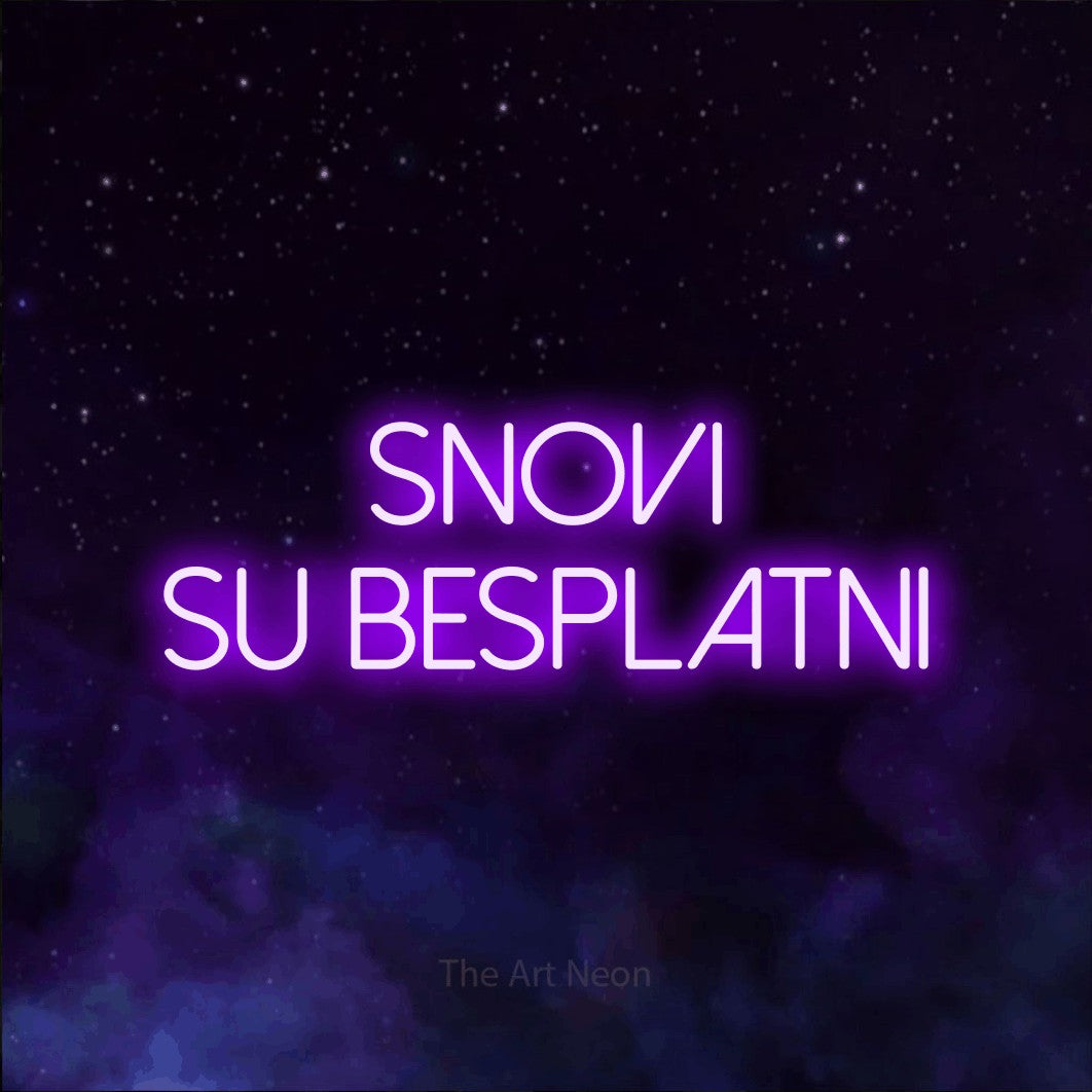 LED neon sign reading “snovi su besplatni”, arranged in two lines.