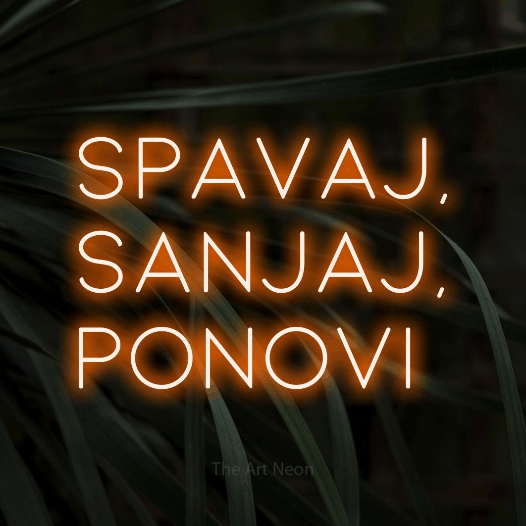 LED neon sign reading “spavaj, sanjaj, ponovi”, arranged in three lines.