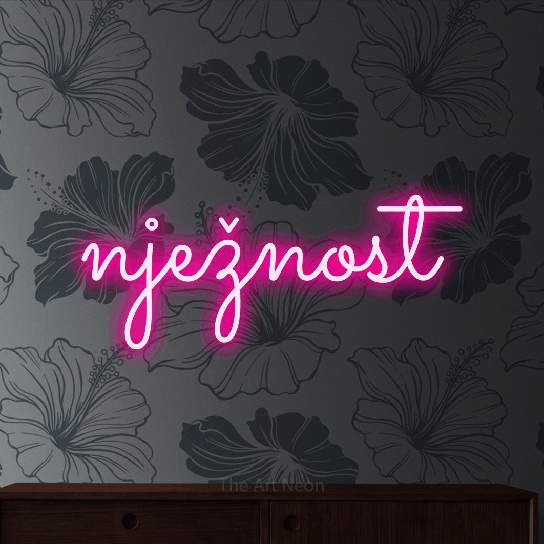 LED neon sign reading “nježnost”, arranged in a single line.