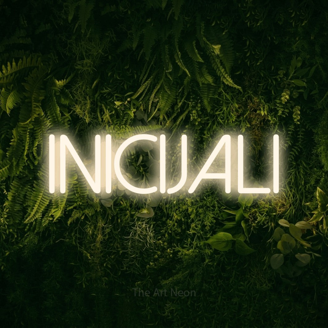 LED neon sign reading “inicijali”, arranged in a single line.