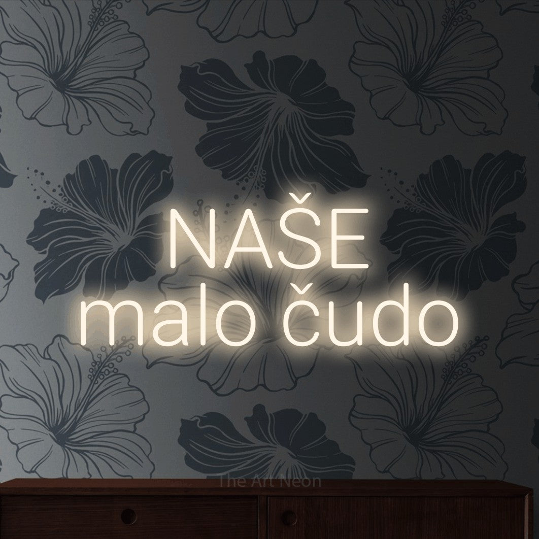 LED neon sign reading “NAŠE malo čudo”, arranged in two lines.