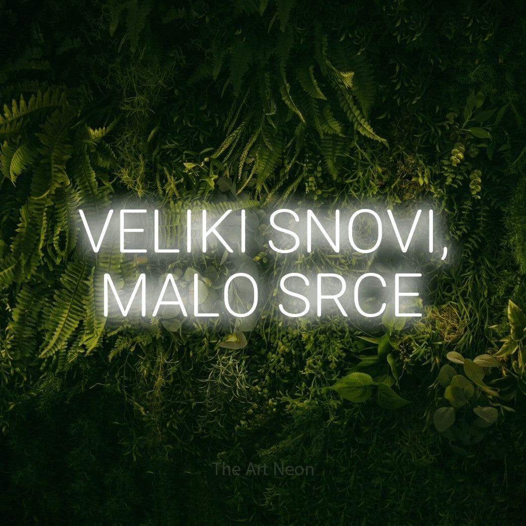 LED neon sign reading “VELIKI SNOVI, MALO SRCE”, arranged in two lines.