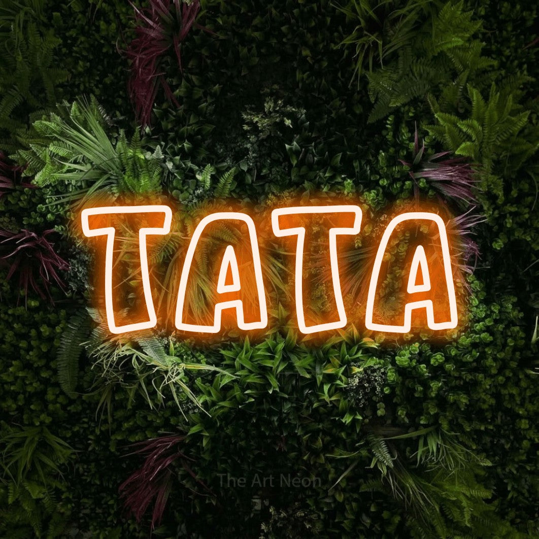 LED neon sign reading “tata”, arranged in a single line.