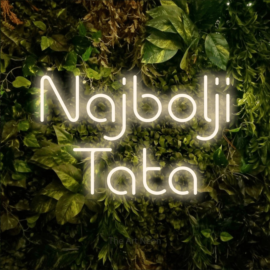 LED neon sign reading “Najbolji Tata”, arranged in two lines.