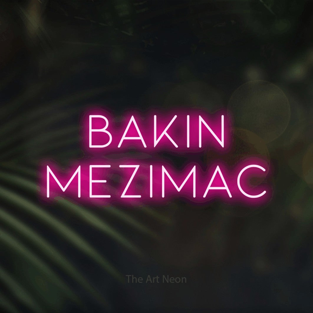 LED neon sign reading “bakin mezimac”, arranged in two lines.