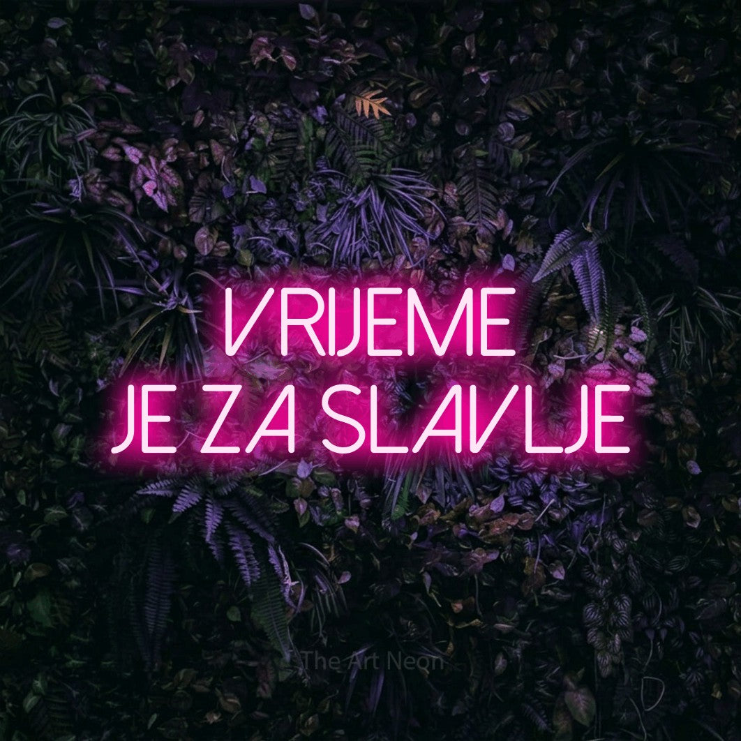 LED neon sign reading “VRIJEME JE ZA SLAVLJE”, arranged in two lines.