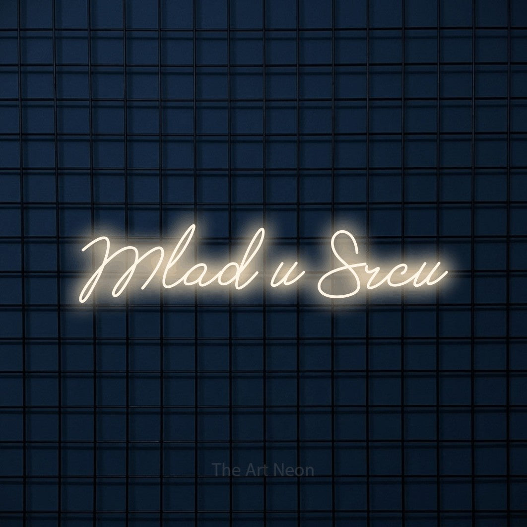 LED neon sign reading “Mlad u Srcu”, arranged in a single line.