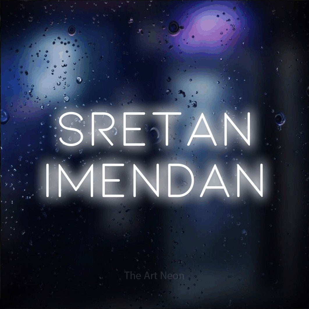 LED neon sign reading “SRETAN IMENDAN”, arranged in two lines.