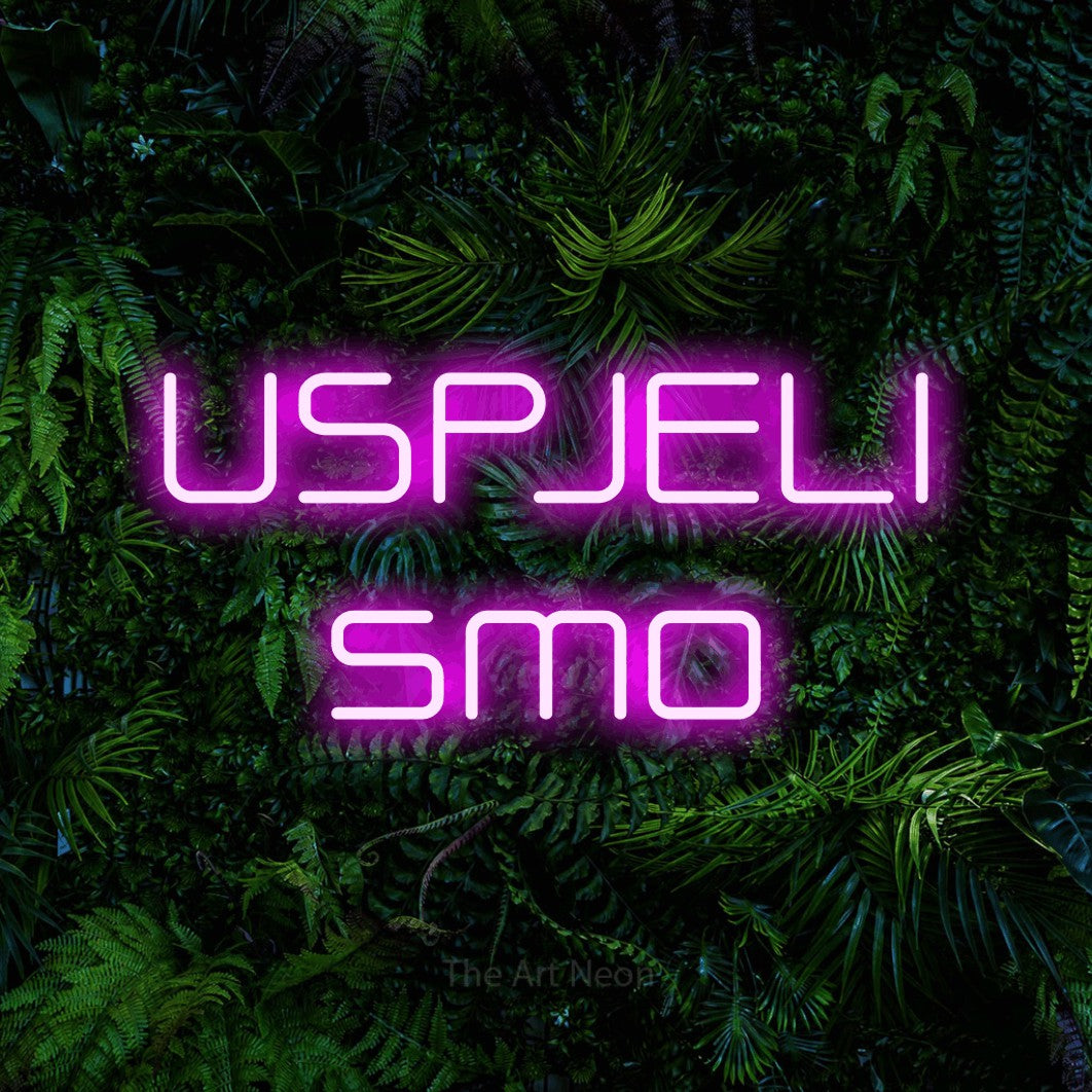 LED neon sign reading “USPJELI smo”, arranged in two lines.