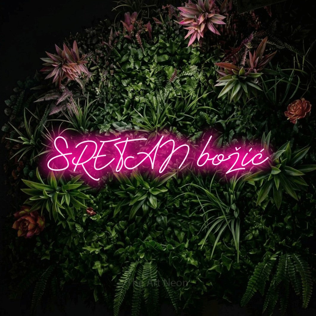 LED neon sign reading “SRETAN božić”, arranged in a single line.