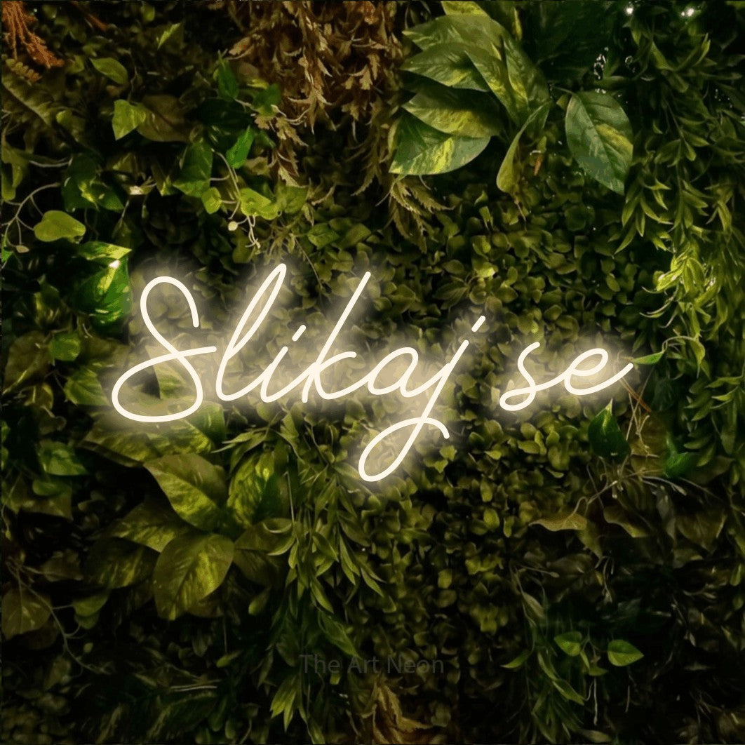 LED neon sign reading “Slikaj se”, arranged in a single line.