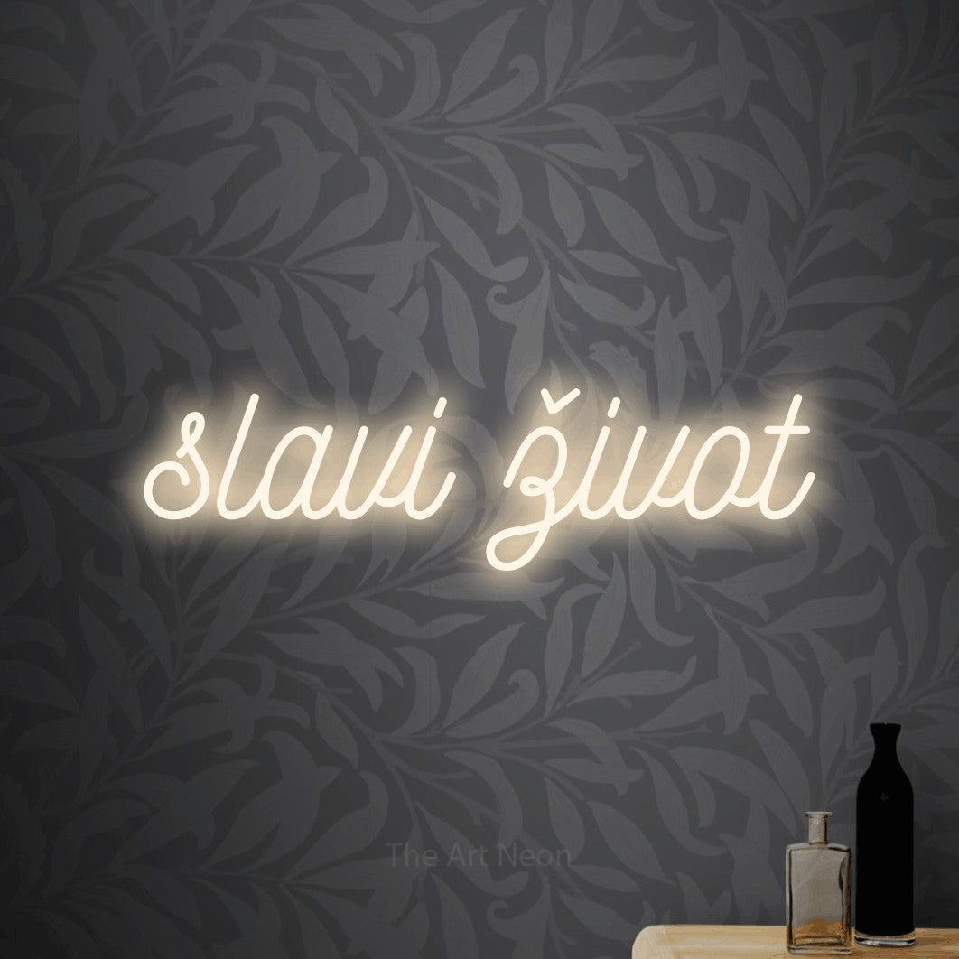 LED neon sign reading “slavi život”, arranged in a single line.
