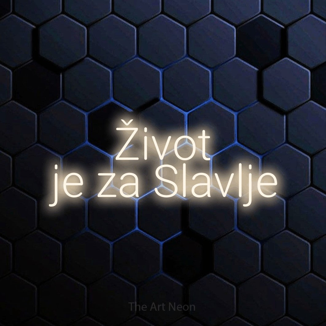 LED neon sign reading “Život je za Slavlje”, arranged in two lines.